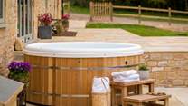 The bubbling hot tub awaits - perfect after a long walk discovering hidden paths in the rolling hills of the Cotswolds