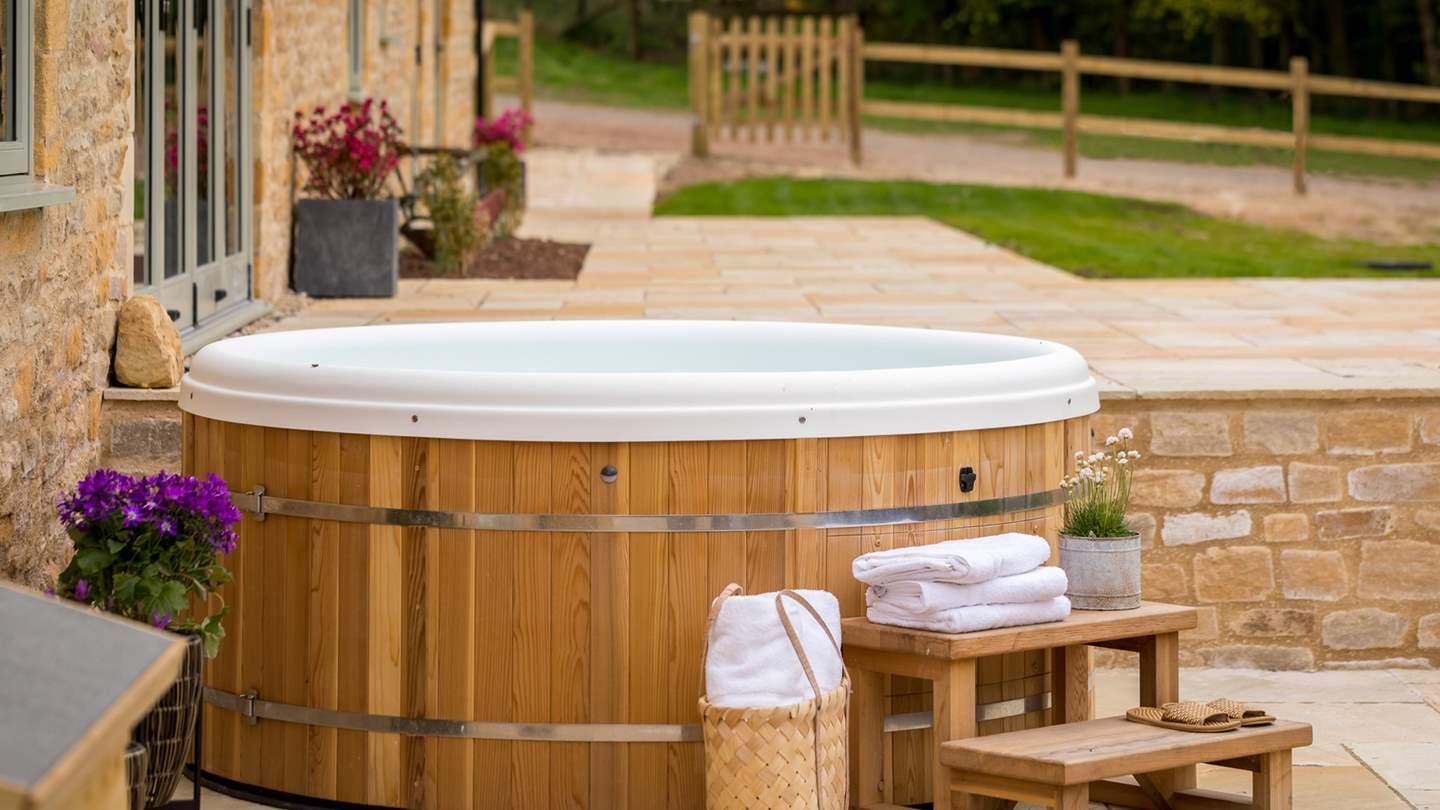 The bubbling hot tub awaits - perfect after a long walk discovering hidden paths in the rolling hills of the Cotswolds