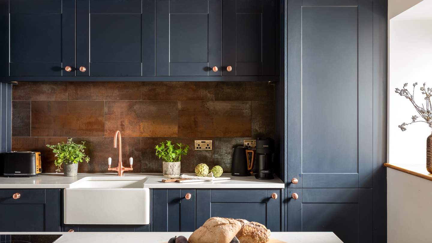 Equally stunning to look at and practical too, the central island is ideal for prepping meals and for snacks on the go