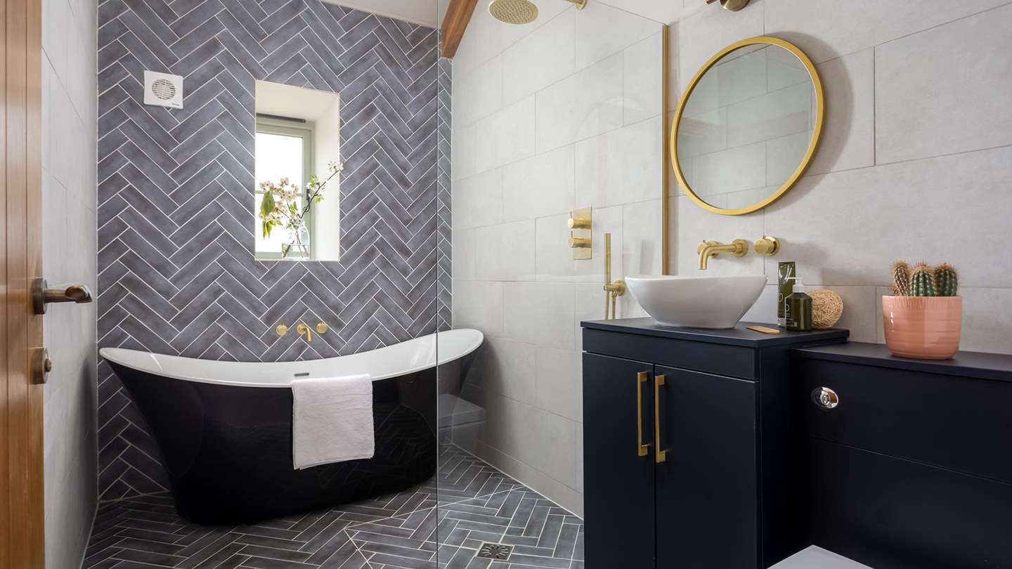 The family bathroom, complete with freestanding bath and walk in shower - just stunning!