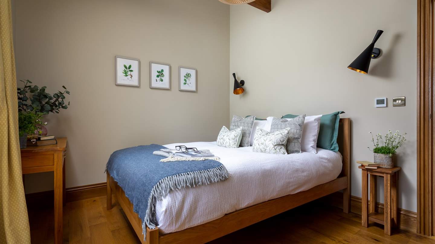 The second bedroom also has an oh-so-comfy king sized bed
