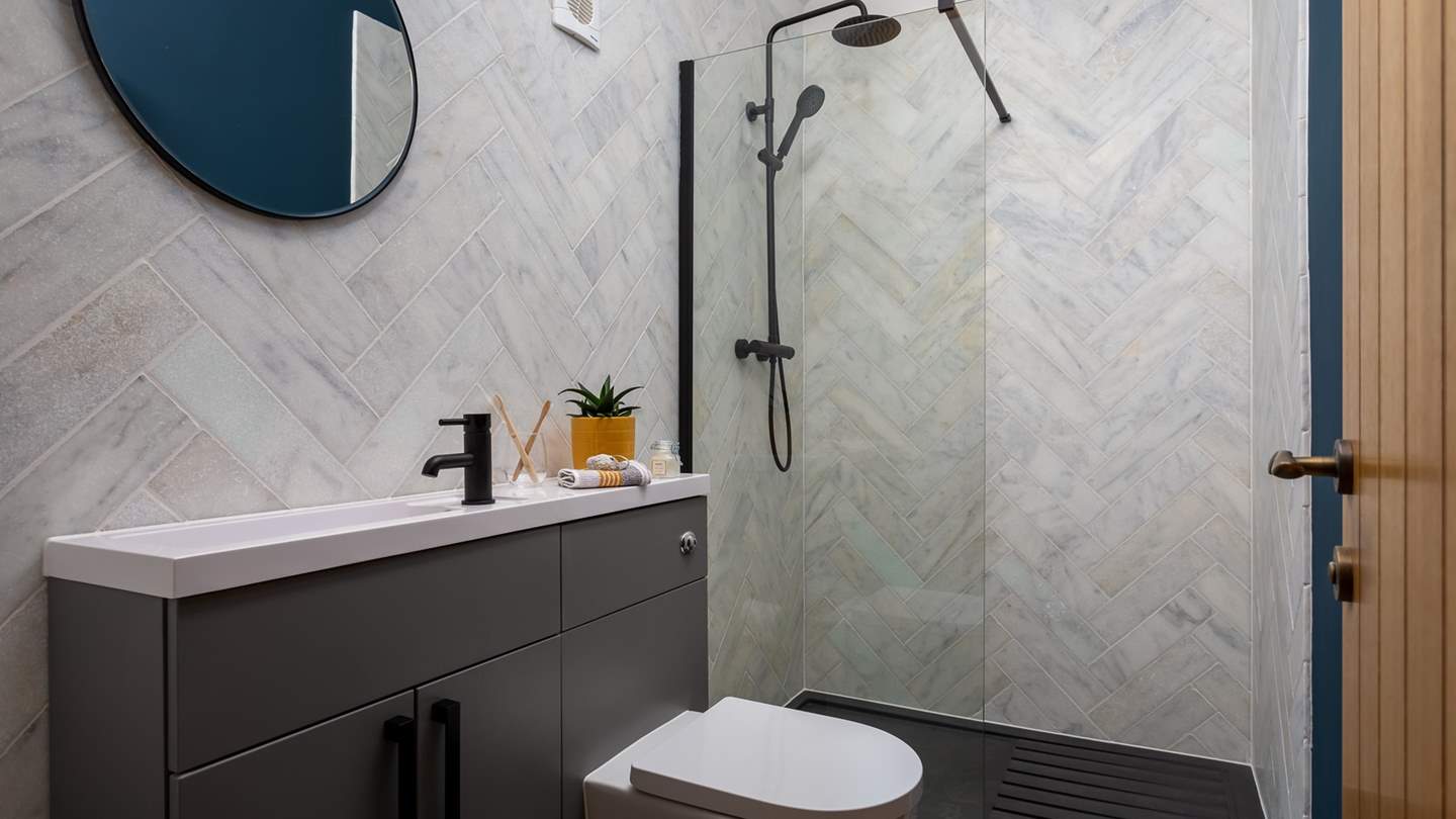 The en suite to the master bedroom, complete with huge walk in shower