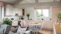 The sitting area leads on to the kitchen and dining room