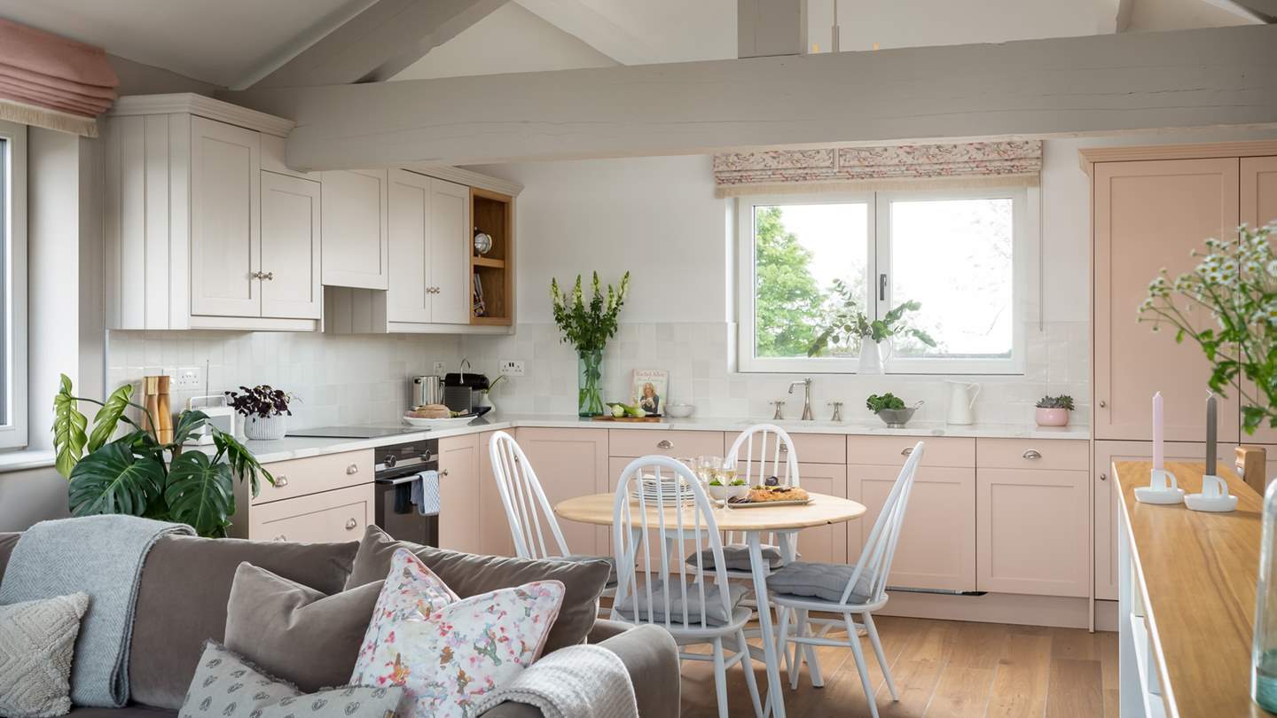 The sitting area leads on to the kitchen and dining room