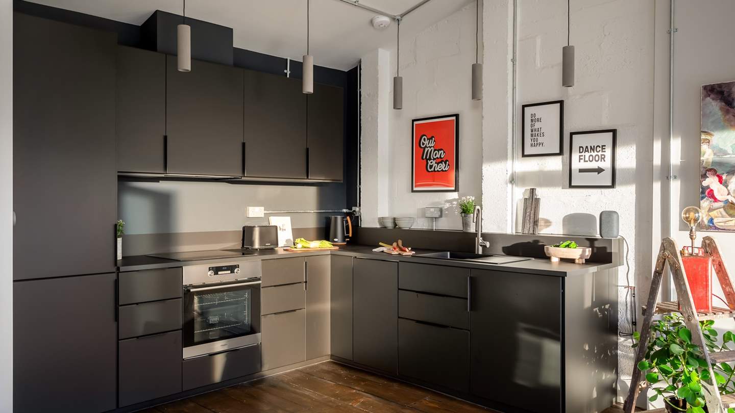 The compact kitchen, complete with everything you'll need to rustle up feasts