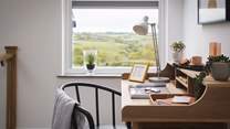 The landing is home to a desk, perfect if you need to catch up with an email or two - or for any creative work