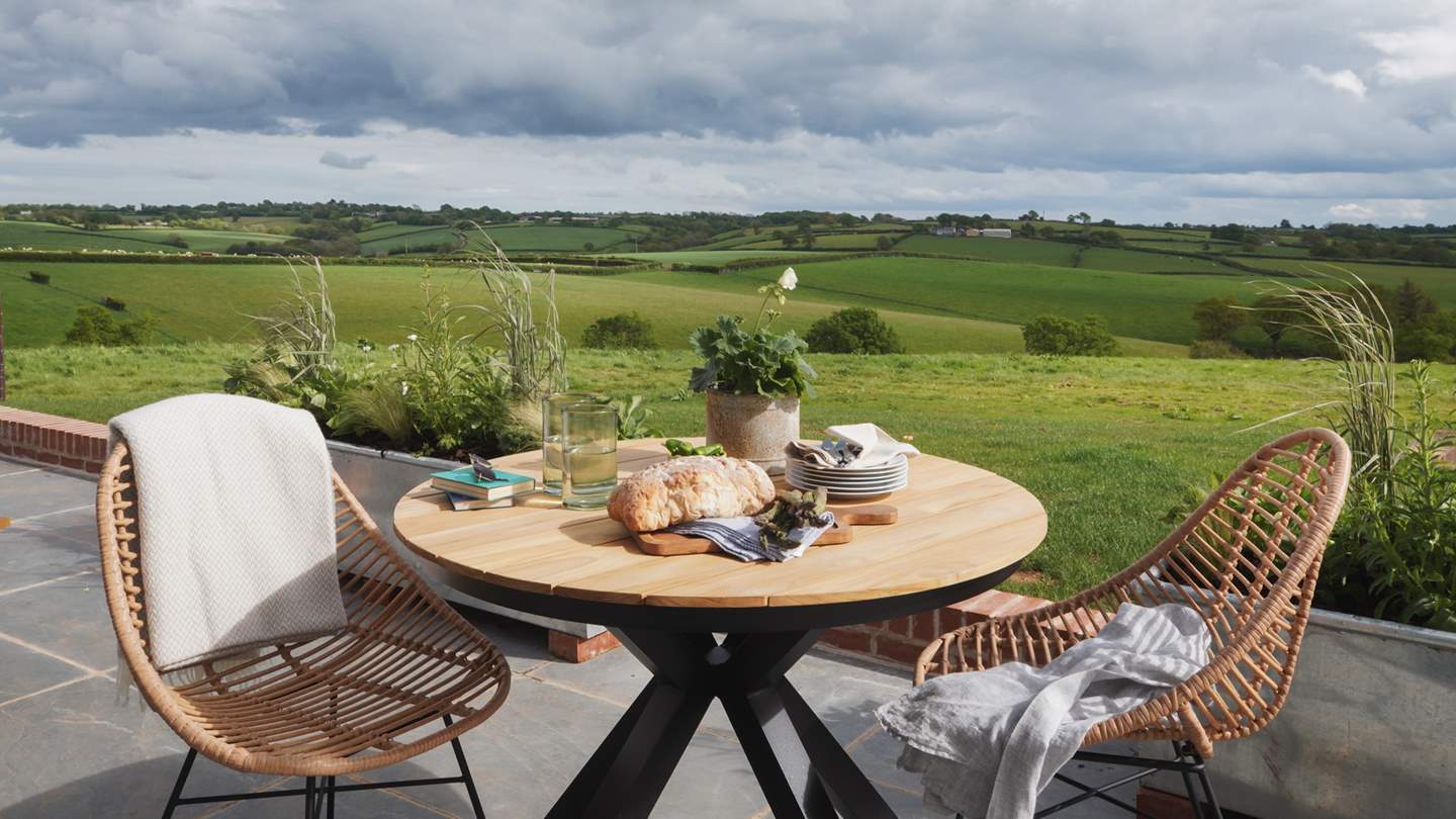 Meals alfresco are a must, with that beautiful view!