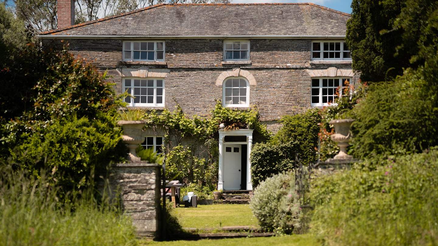 The gorgeous walled garden is resplendent with herbaceous borders 