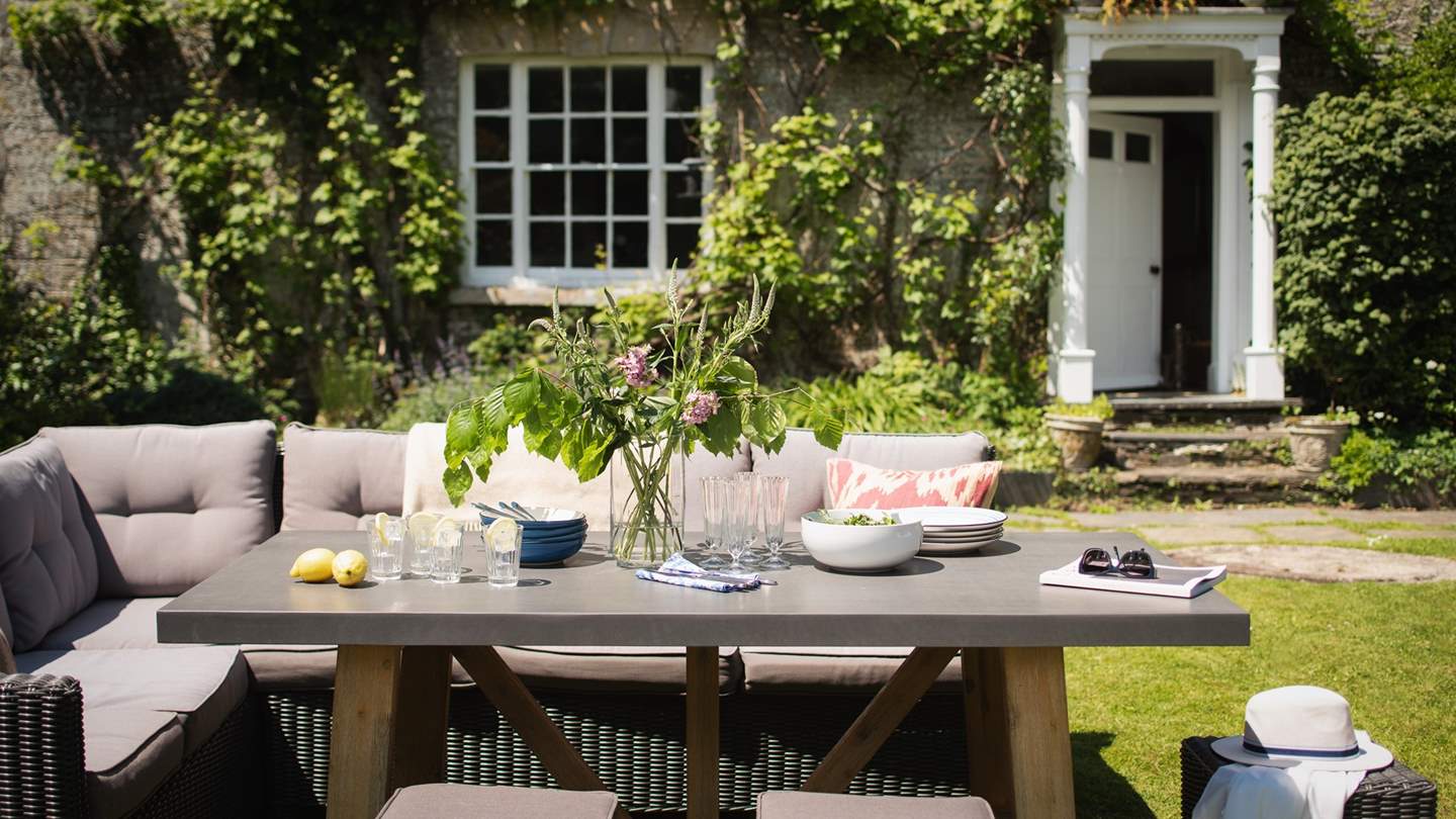 The dining table and chairs are perfect for enjoying delicious tipples on a balmy summer afternoon... 
