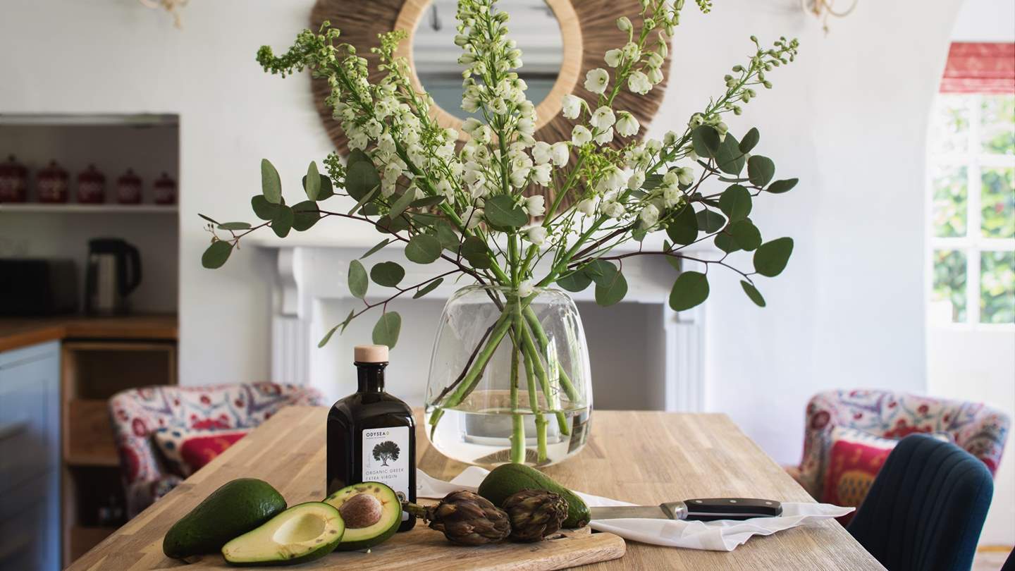 The two gorgeous bespoke armchairs ensure the cook's companions can sit in comfort...