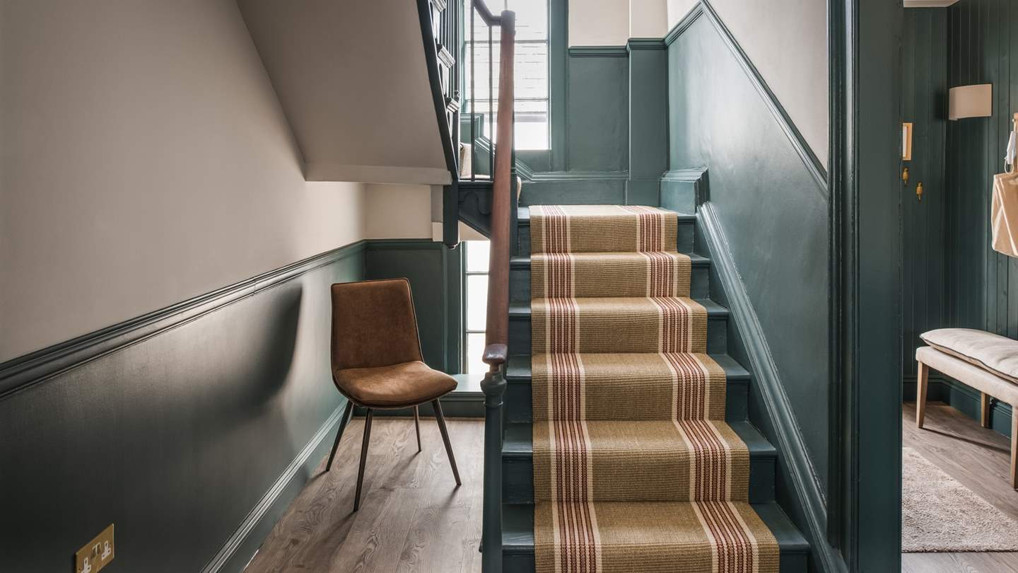 Take the stairs to uncover Arina's beautiful bedrooms...