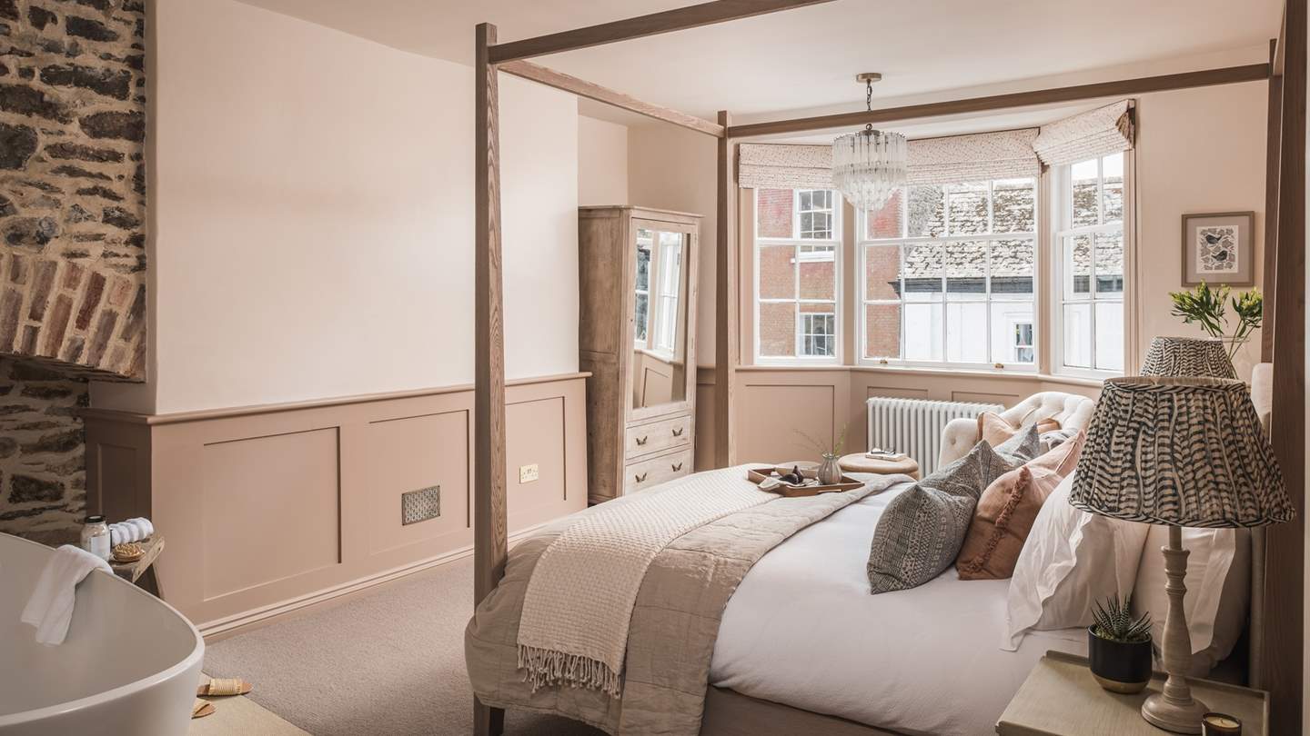 The huge bay window makes this a light, airy room