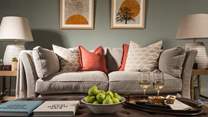 The sumptuous sofa invites you to sit back and relax