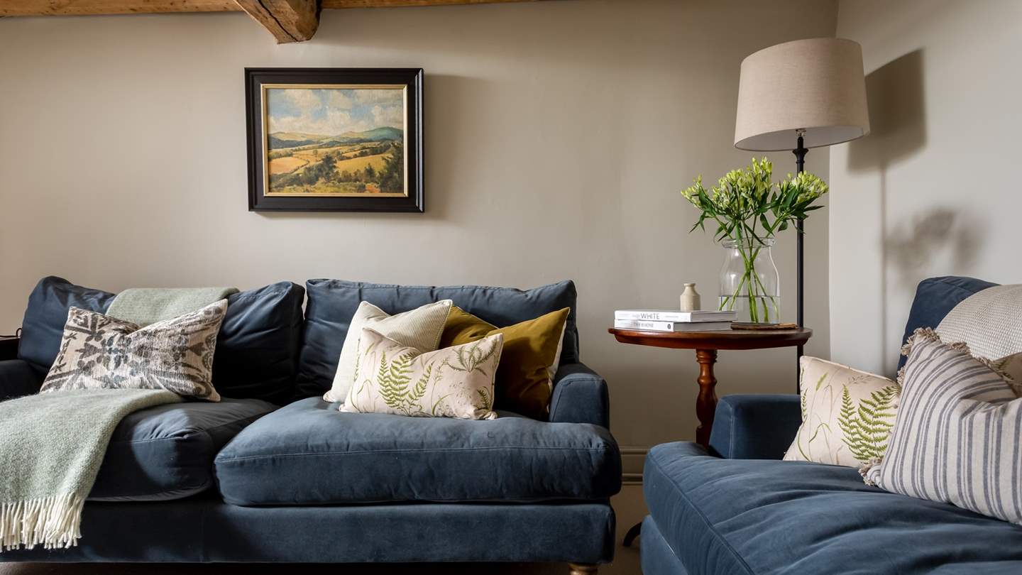 The sumptuous blue velvet sofas, made for sinking in to...