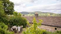 With two terraced areas, you'll have wonderful views over the cottage to the rolling green hills beyond