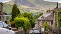 The village of Castleton is  surrounded by dramatic scenery, including imposing Mam Tor