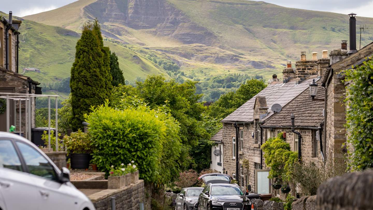 The village of Castleton is  surrounded by dramatic scenery, including imposing Mam Tor