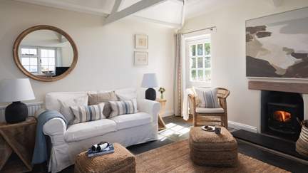 With a flickering wood burner, Menaring Cottage is a fabulous retreat whatever time of year you visit
