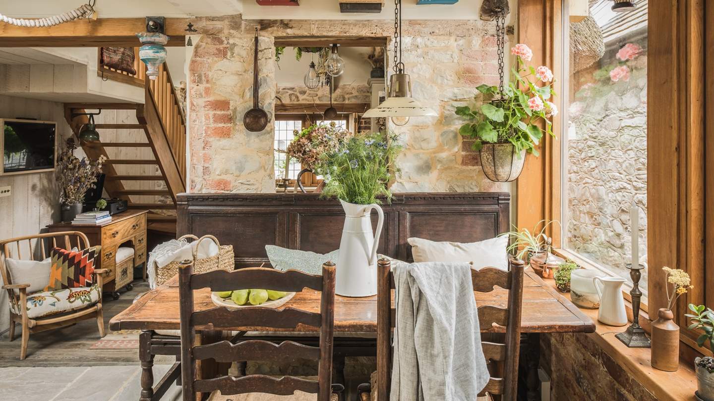 This atmospheric space is oak framed with huge windows so offers plenty of light and leads out into the courtyard garden