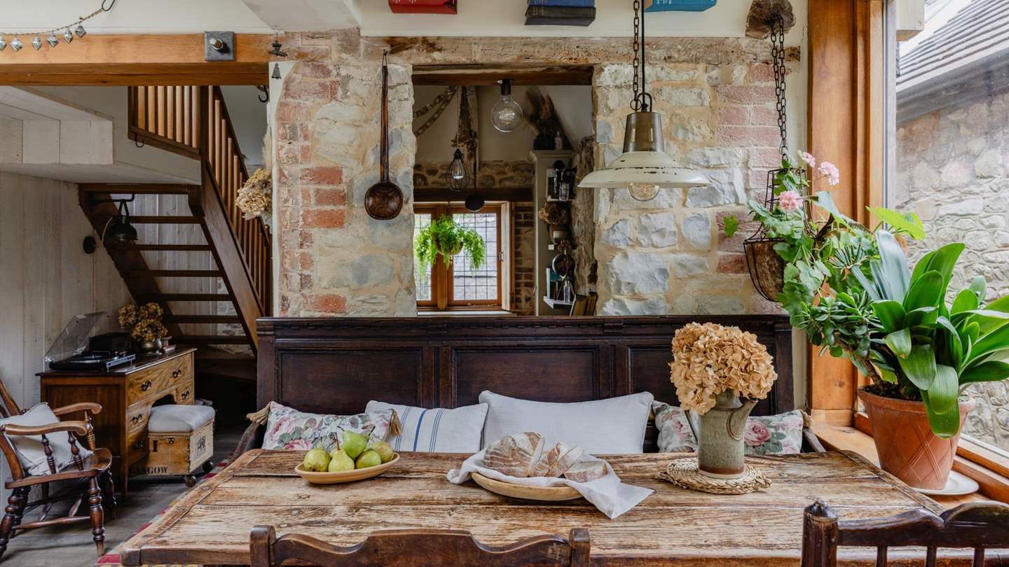 This atmospheric space is oak framed with huge windows so offers plenty of light and leads out into the courtyard garden
