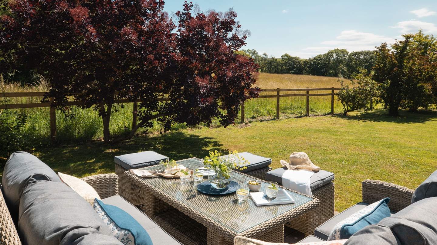 Rosmelin has a beautiful, enclosed garden with jaw-dropping views over the surrounding fields, hills and woodland