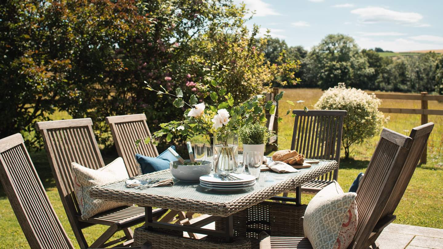 The pretty, enclosed garden offers a peaceful escape with stunning countryside views - yet you're just a short drive away from the coast
