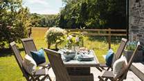 Rosmelin has a beautiful, enclosed garden with jaw-dropping views over the surrounding fields, hills and woodland
