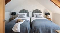 We just love the vaulted ceilings in the bedrooms, with Velux windows which flood the rooms in soft light