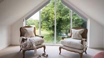 The huge window in the master bedroom affords stunning views from the comfort of bed...