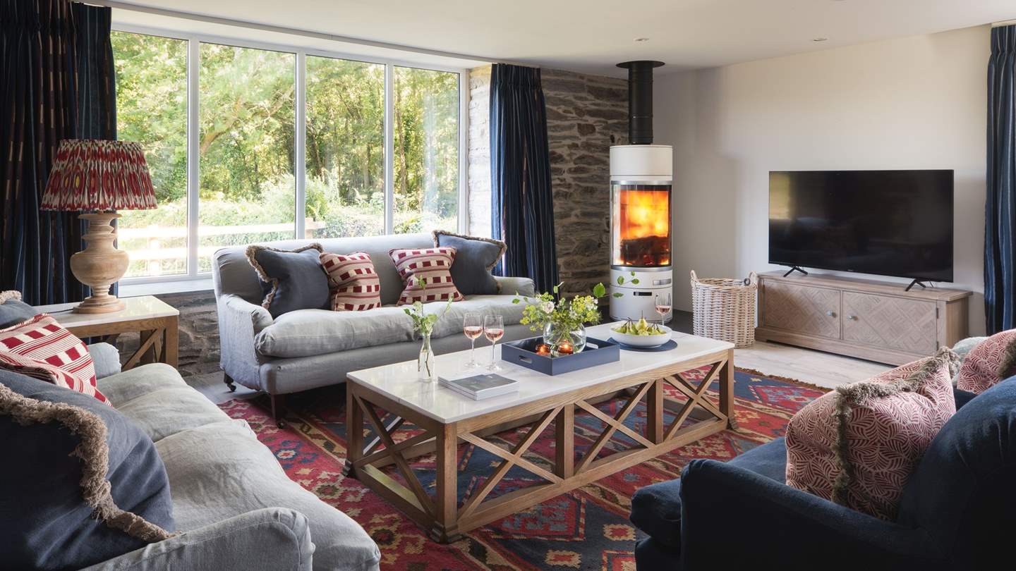 The fabulous, modern wood burner makes the room fabulously cosy on cooler days...