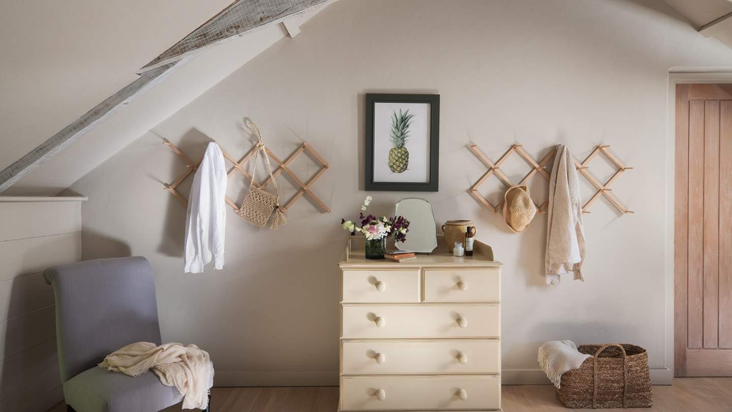 This room has plenty of hanging space for your belongings 