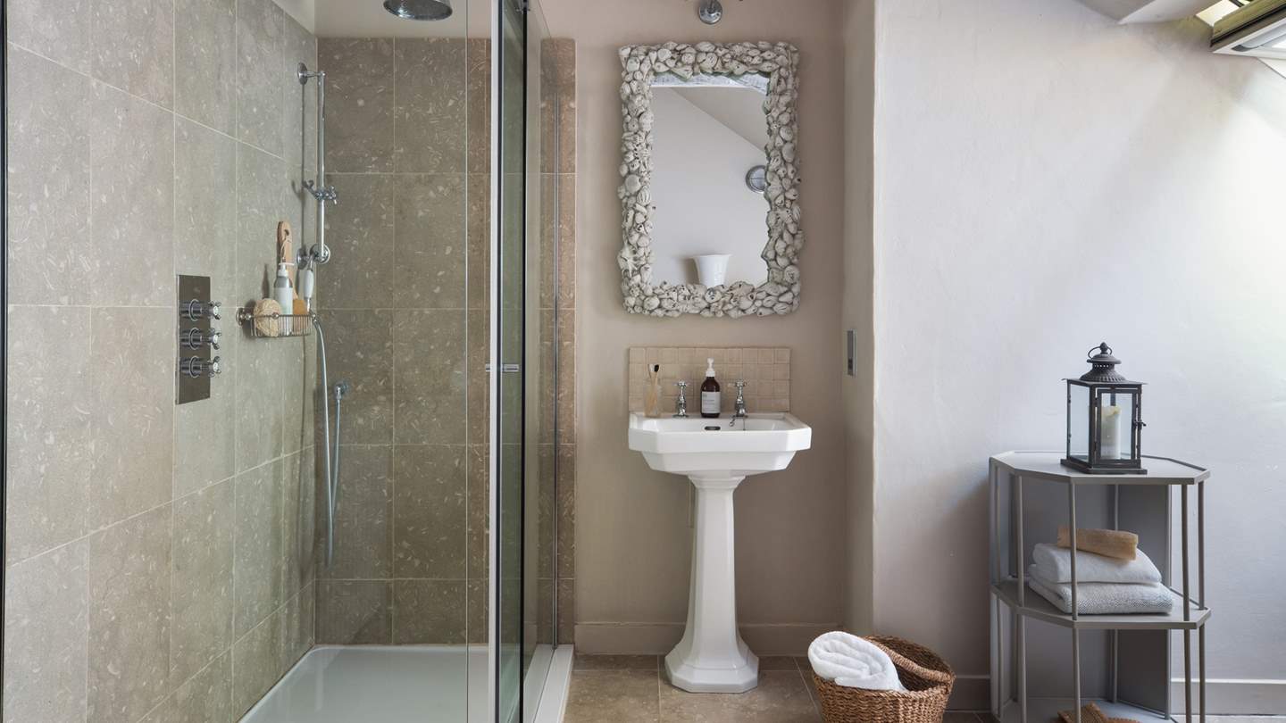 This bathroom also benefits from a large walk-in shower