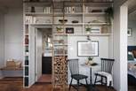 The eye-catching library-style shelving and antique ladder 