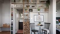 The eye-catching library-style shelving and antique ladder 