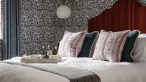 The sumptuous king size bed is perfect for long lie-ins