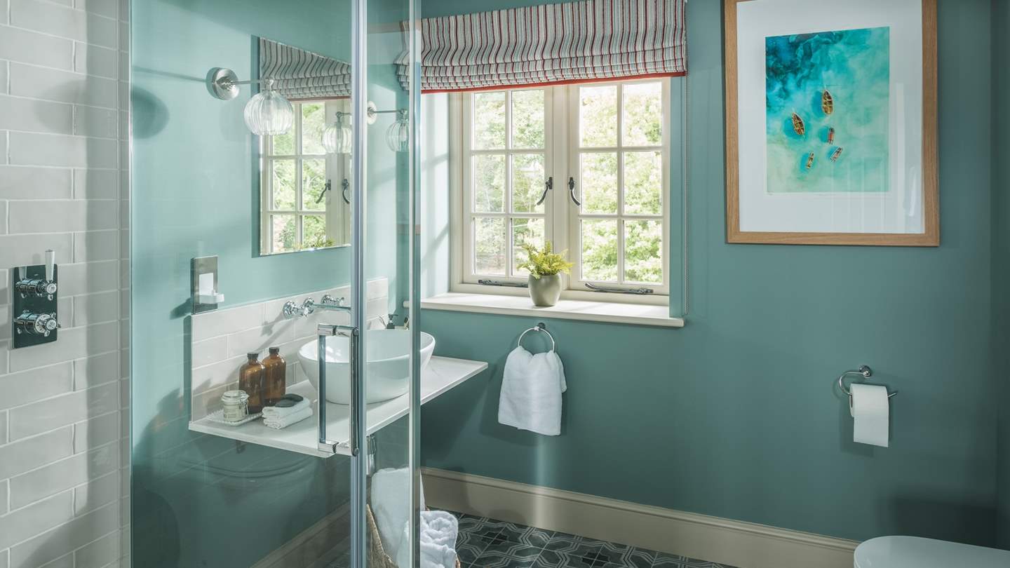 We love the pretty patterned tiles in the master ensuite