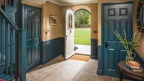 Receive a splendid, warm welcome as you step through the impressive front door