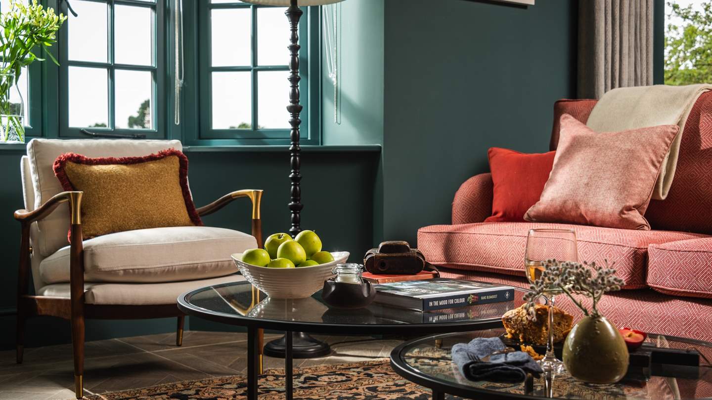 Enjoy pre and post dinner drinks on the charming Soho Home armchair 