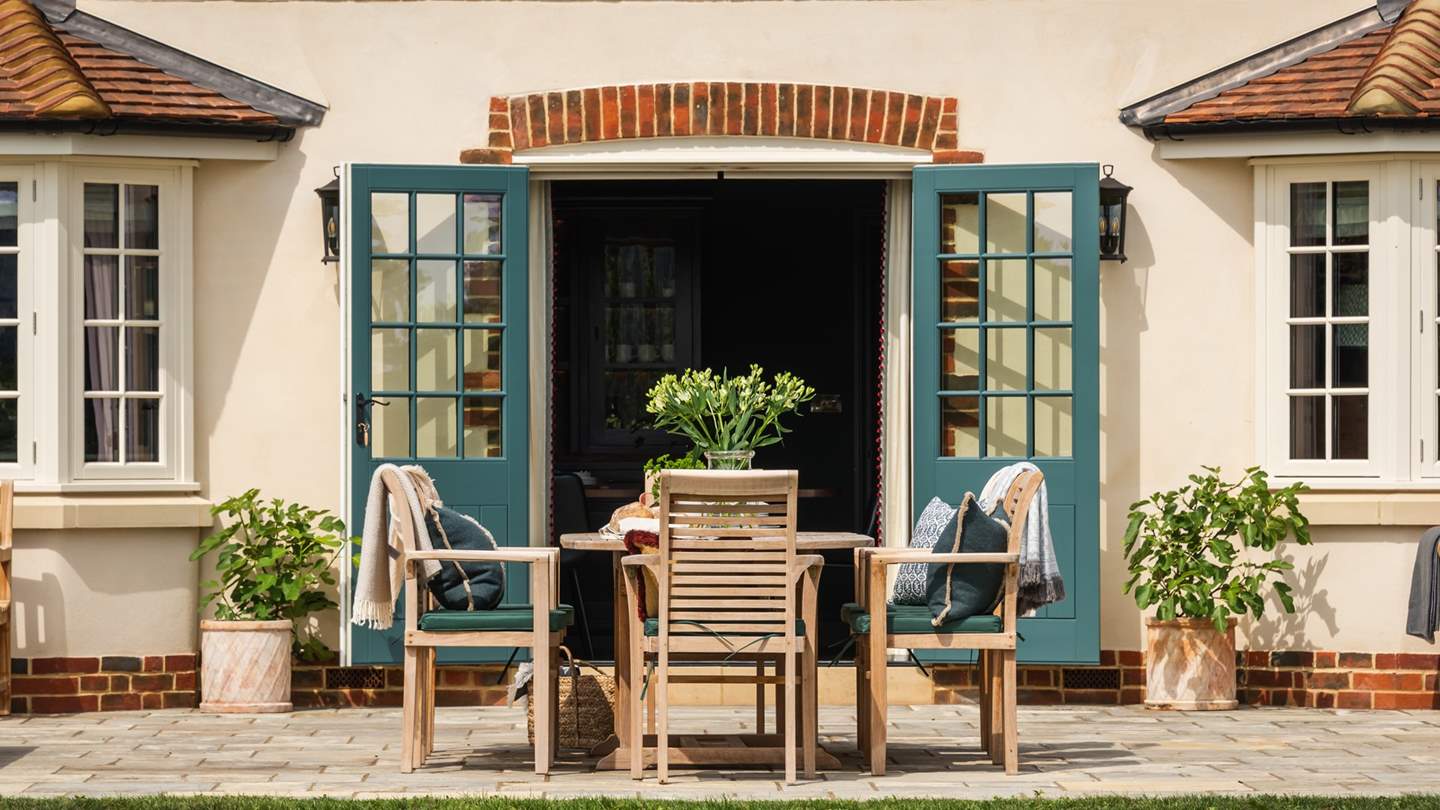 Open the French doors onto the sunny terrace