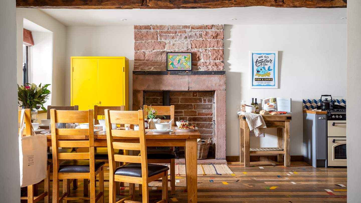Gather together in the open plan kitchen and dining space 