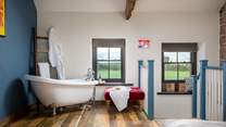 Romantic moments reside in this dreamy spot, with a fabulous roll top bath to enjoy long soaks...