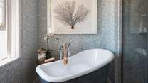Savour long, bubble filled soaks in the stunning slipper bath 