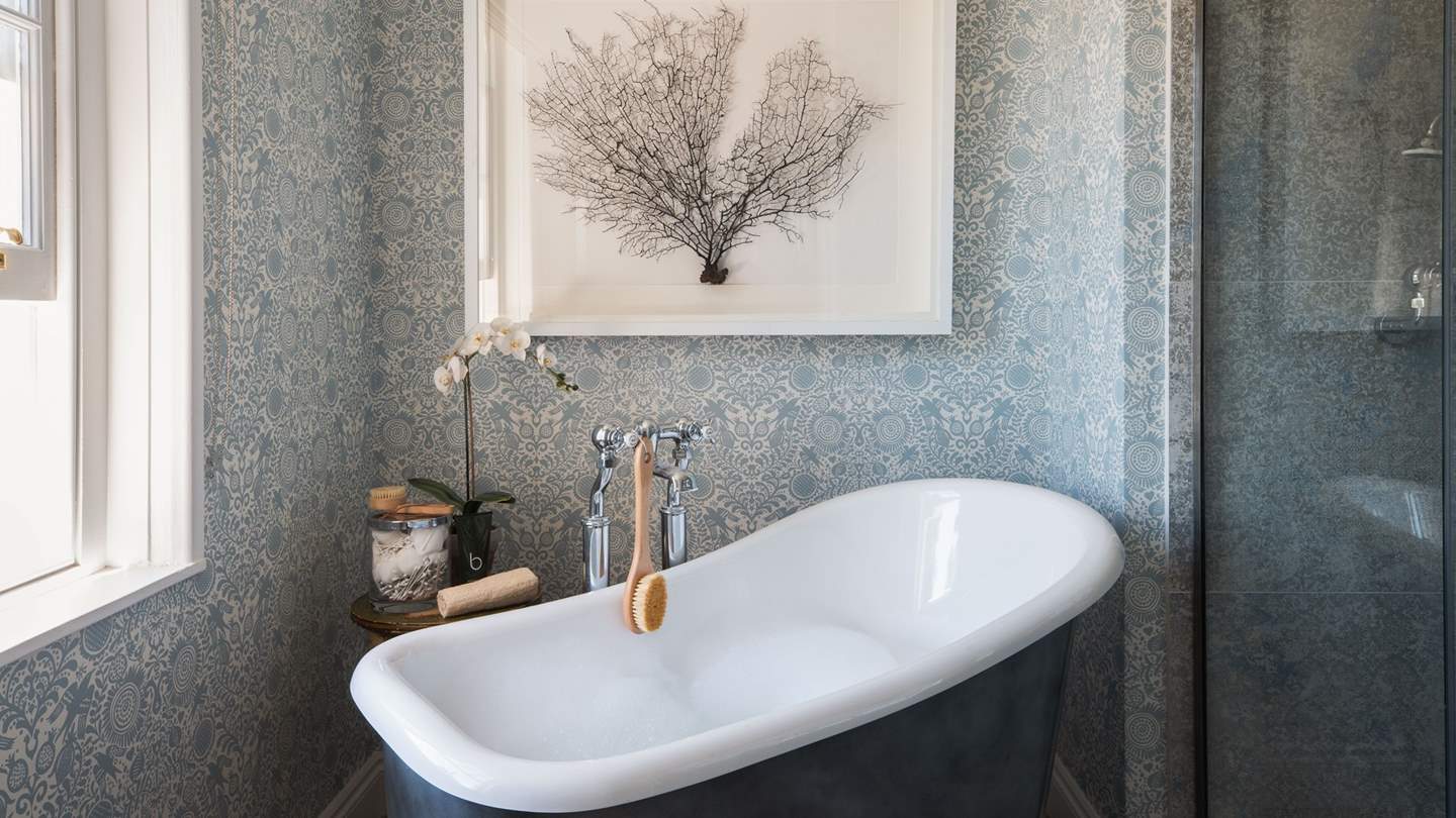 Savour long, bubble filled soaks in the stunning slipper bath 