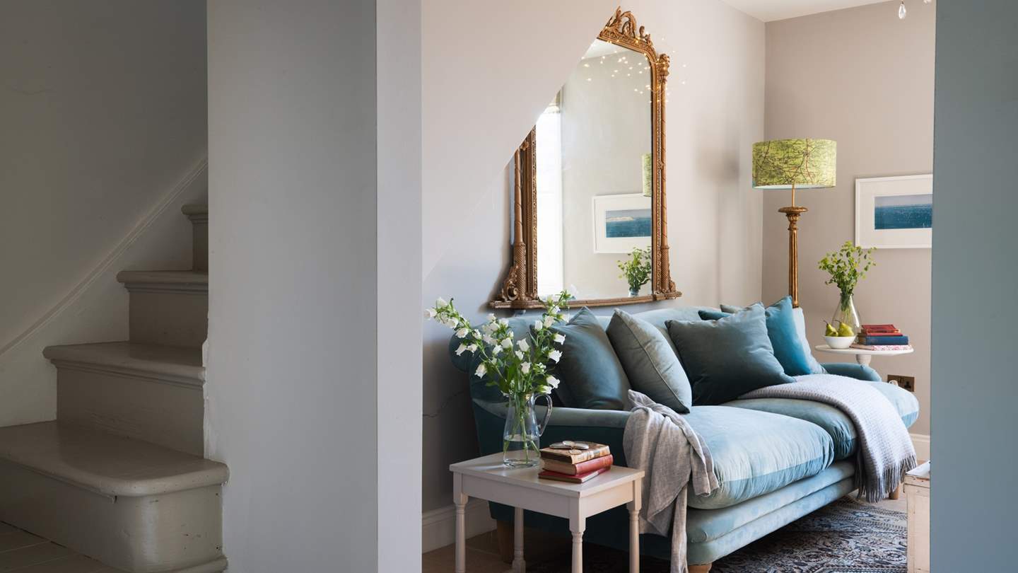 We adore the antique style mirror in the sitting room 
