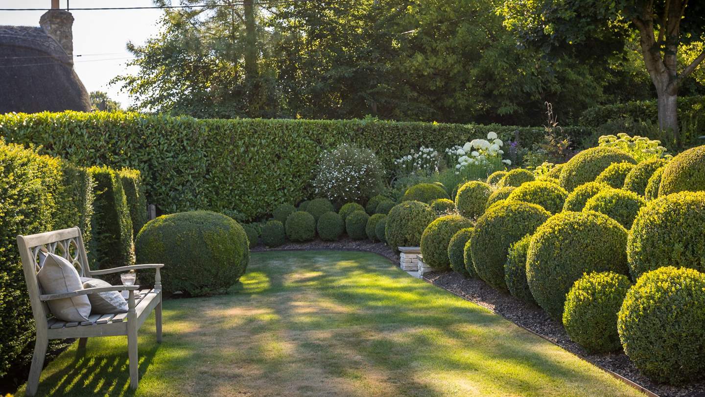 The beautifully manicured gardens with gorgeous topiary are simply a dream 