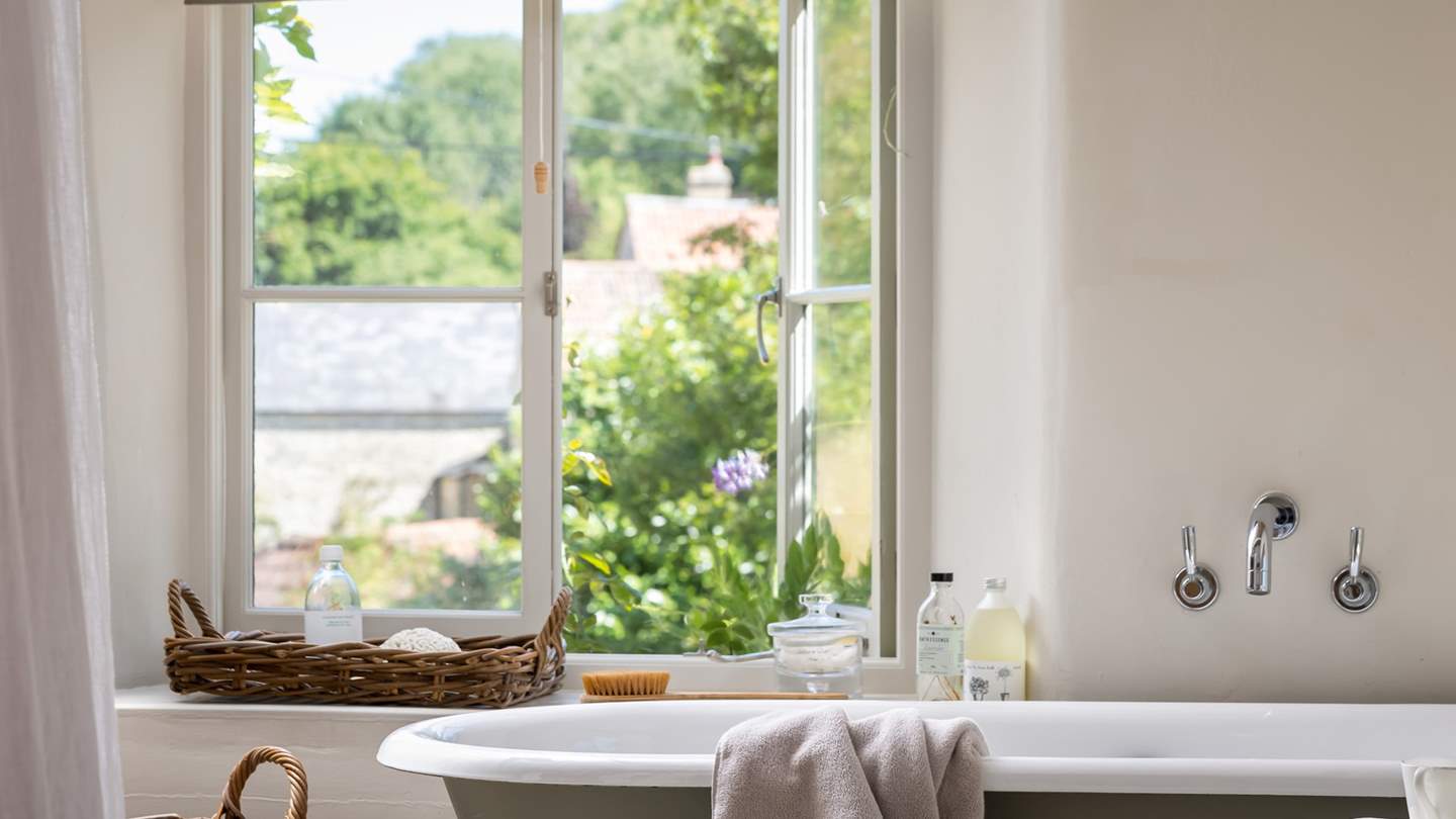 Savour bubble filled soaks in this darling slipper bath 