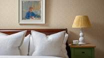 Each bed is swathed in luxurious linens for a blissful night's sleep...