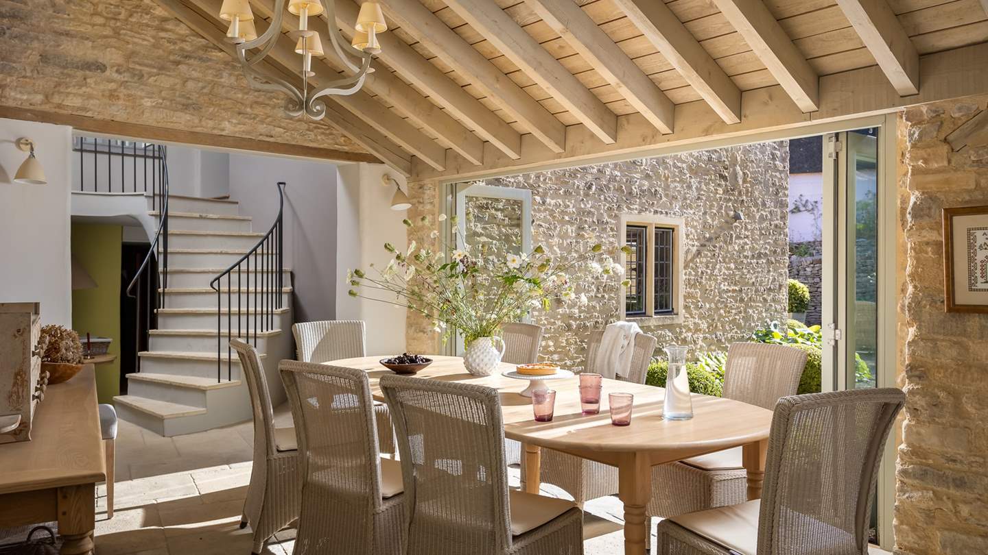 Enjoy grand meals around the formal dining table, with bifold doors that can be opened on warmer days 