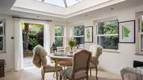 The wonderful open-plan kitchen dining space with an exquisite vaulted ceiling