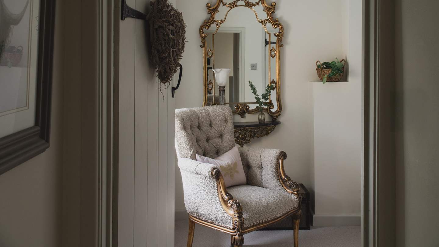 The opulent master bedroom in soft beige shades is a heavenly space to unwind